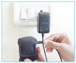 a hand holding a cell phone