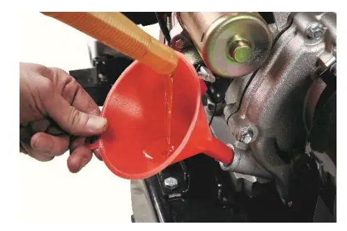 P-Lindberg 9062071 Wood Chipper - Carefully fill oil with a funnel as shown