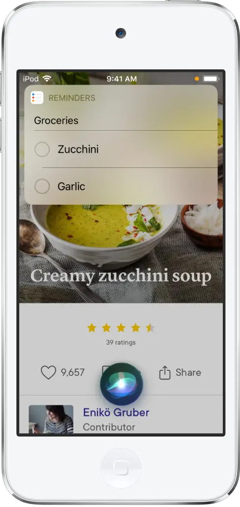 Siri displays a reminders list called Groceries with zucchini and garlic listed. The list appears over a recipe for creamy zucchini soup.