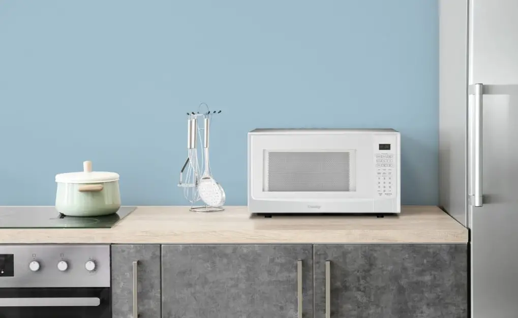 Danby Ddmw01440wg1 1.4 Cubic Foot Sensor Microwave Oven Owner's Manual Danby Ddmw01440wg1 1.4 Cubic Foot Sensor Microwave Oven Owner's Manual