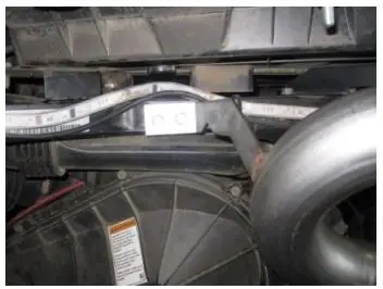 GIBSON 98023 Dual Rear Exhaust Instruction Manual - With the springs installed and the exhaust