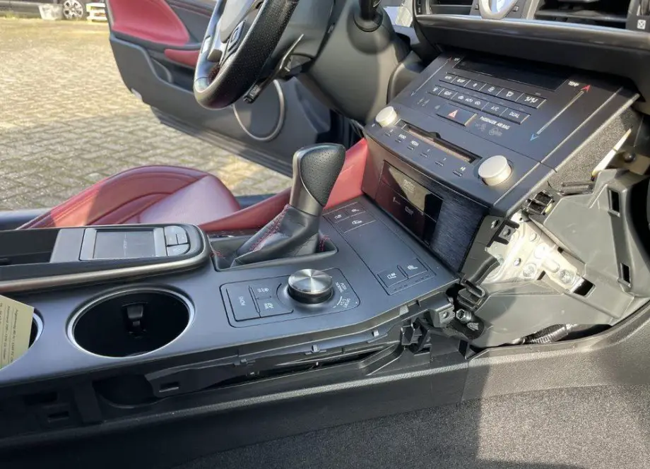 Unscrew both long panels