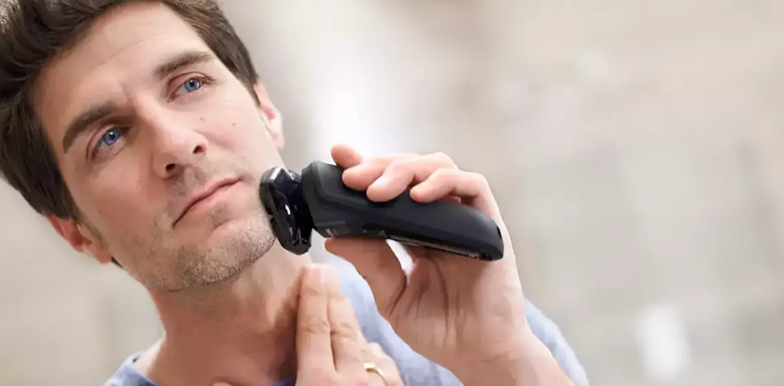 Philips X5012-05 Wet And Dry Electric Shaver User Manual