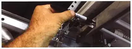 Mark holes in door bracket feet Figure 2