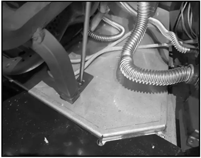 Securing log grate to the floor