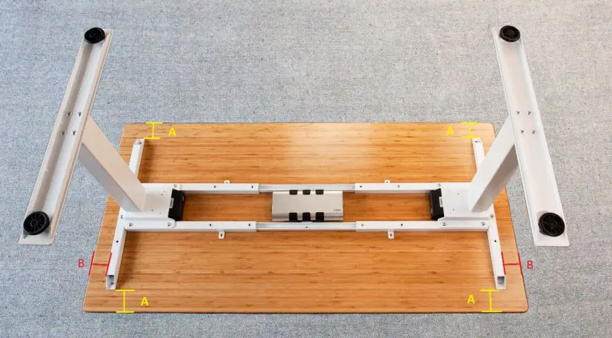 UpDown Desk PRO-Series Electric Standing Desk User Guide - Position the constructed frame in the centre